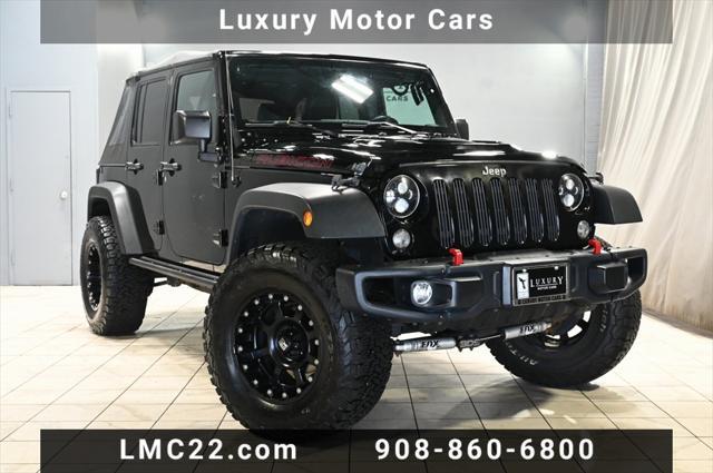 used 2016 Jeep Wrangler Unlimited car, priced at $27,118