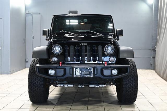 used 2016 Jeep Wrangler Unlimited car, priced at $27,118