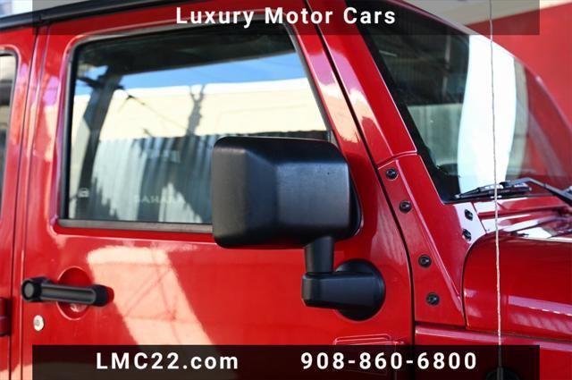 used 2014 Jeep Wrangler Unlimited car, priced at $14,221