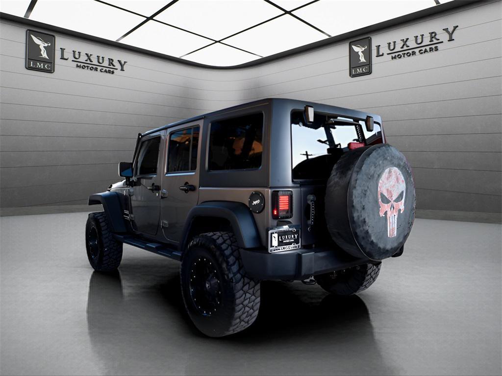 used 2018 Jeep Wrangler JK Unlimited car, priced at $21,487