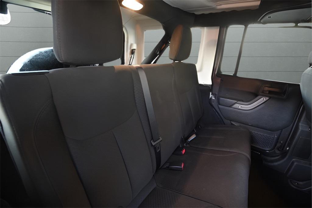 used 2018 Jeep Wrangler JK Unlimited car, priced at $21,487