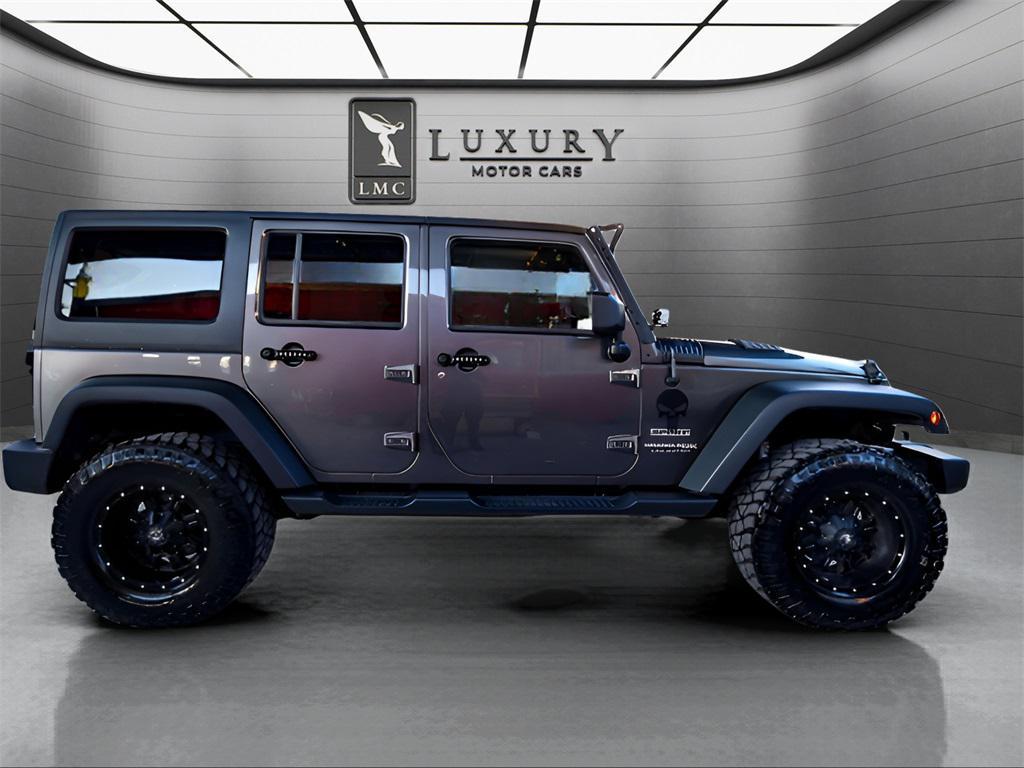 used 2018 Jeep Wrangler JK Unlimited car, priced at $21,487