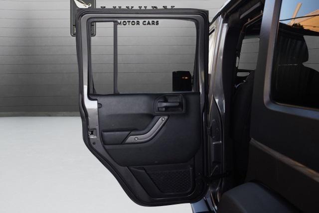 used 2018 Jeep Wrangler JK Unlimited car, priced at $21,487