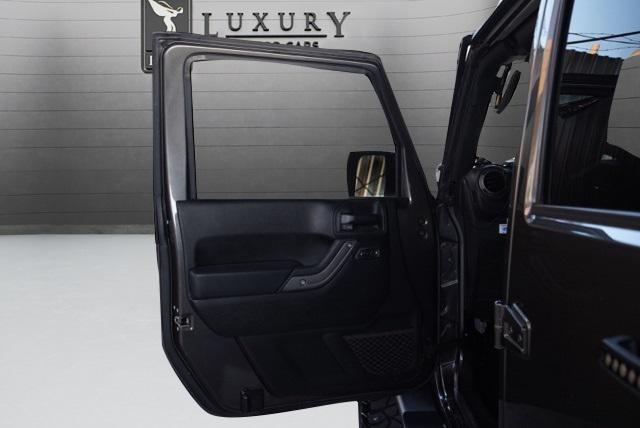 used 2018 Jeep Wrangler JK Unlimited car, priced at $21,487