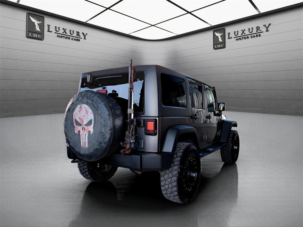 used 2018 Jeep Wrangler JK Unlimited car, priced at $21,487