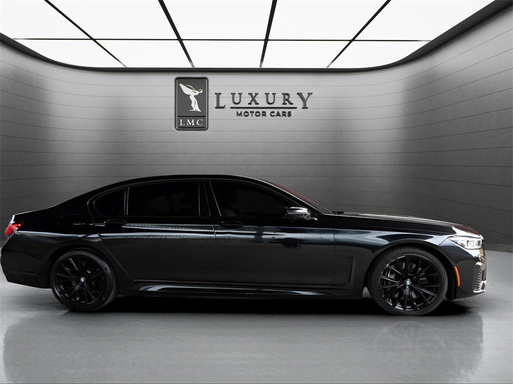 used 2022 BMW 750 car, priced at $43,589