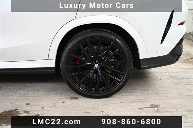 used 2025 BMW X6 car, priced at $85,894
