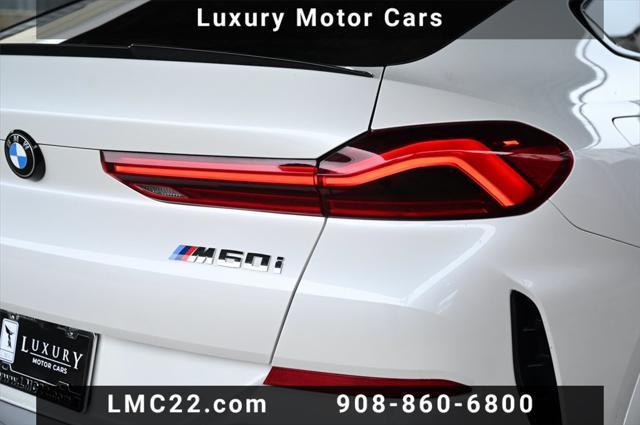 used 2025 BMW X6 car, priced at $85,894