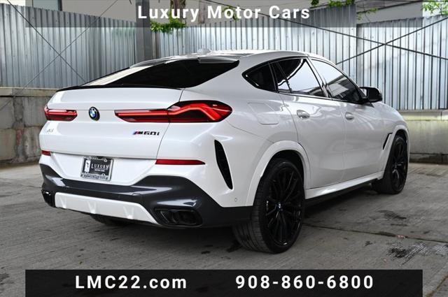 used 2025 BMW X6 car, priced at $85,894