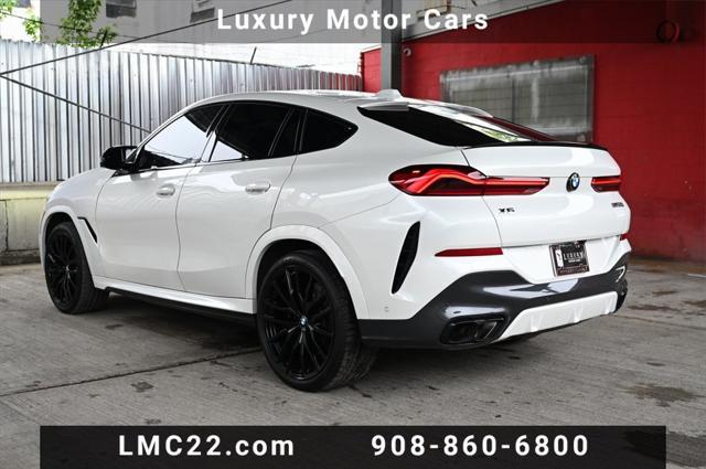 used 2025 BMW X6 car, priced at $85,894
