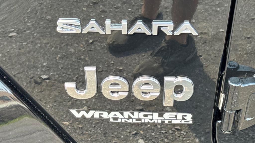 used 2021 Jeep Wrangler Unlimited car, priced at $31,895