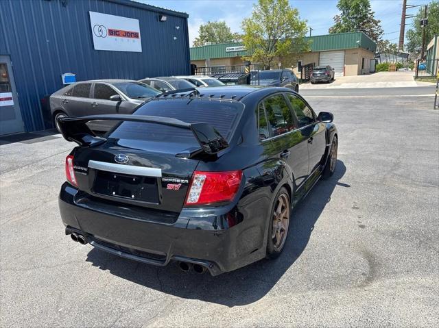 used 2011 Subaru Impreza WRX STi car, priced at $12,888