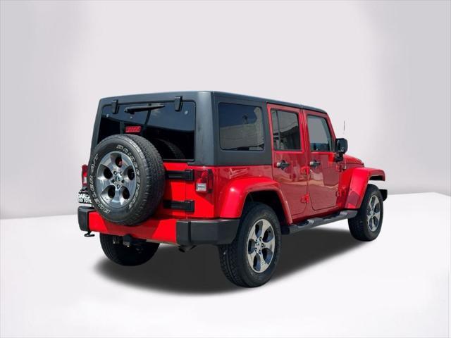 used 2018 Jeep Wrangler JK Unlimited car, priced at $23,390