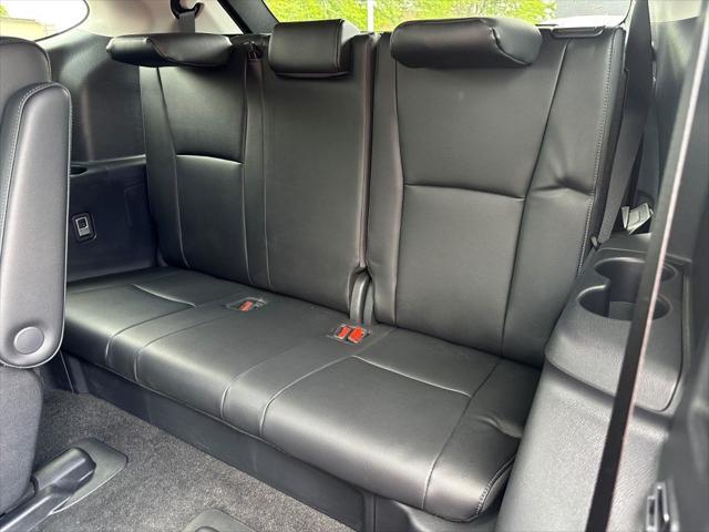used 2024 Toyota Highlander Hybrid car, priced at $50,499