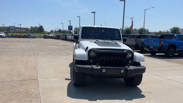 used 2014 Jeep Wrangler Unlimited car, priced at $13,550