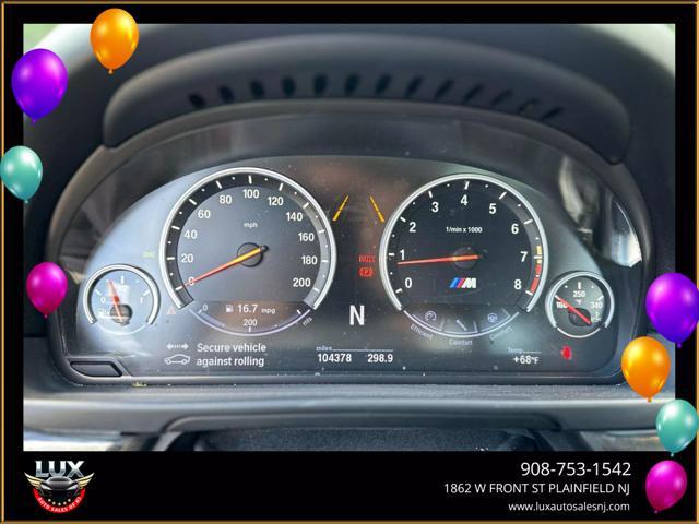 used 2013 BMW M5 car, priced at $23,495