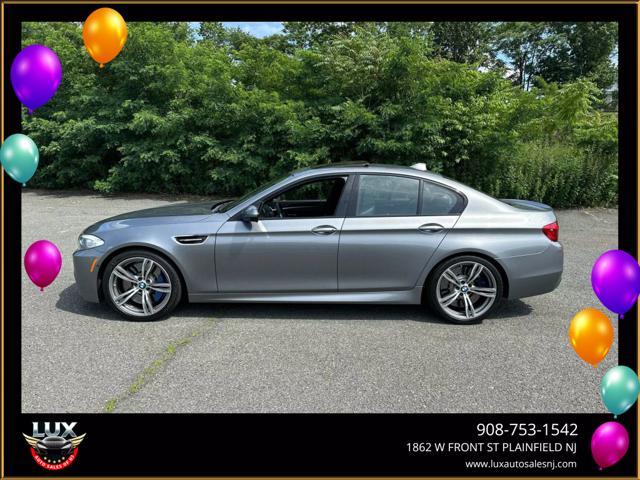 used 2013 BMW M5 car, priced at $23,495