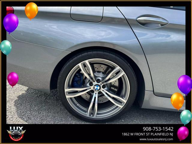 used 2013 BMW M5 car, priced at $23,495
