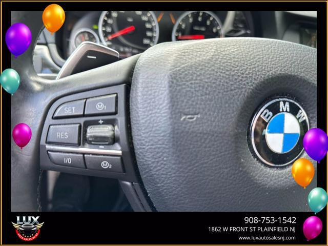 used 2013 BMW M5 car, priced at $23,495