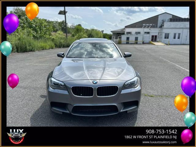 used 2013 BMW M5 car, priced at $23,495
