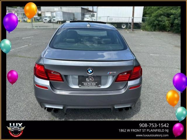 used 2013 BMW M5 car, priced at $23,495
