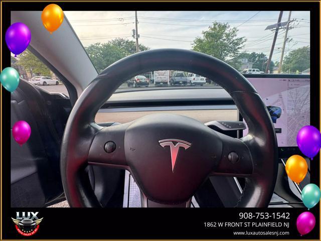 used 2018 Tesla Model 3 car, priced at $15,900