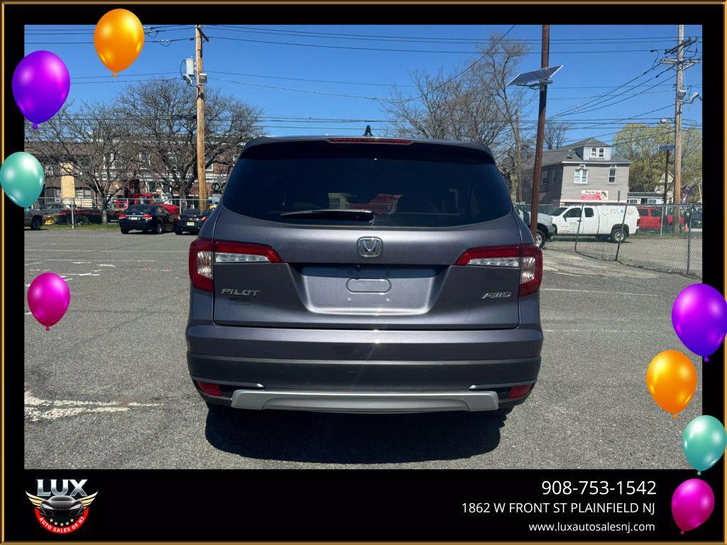 used 2021 Honda Pilot car, priced at $19,590