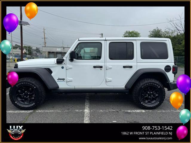 used 2023 Jeep Wrangler 4xe car, priced at $27,995