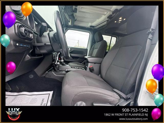 used 2023 Jeep Wrangler 4xe car, priced at $27,995