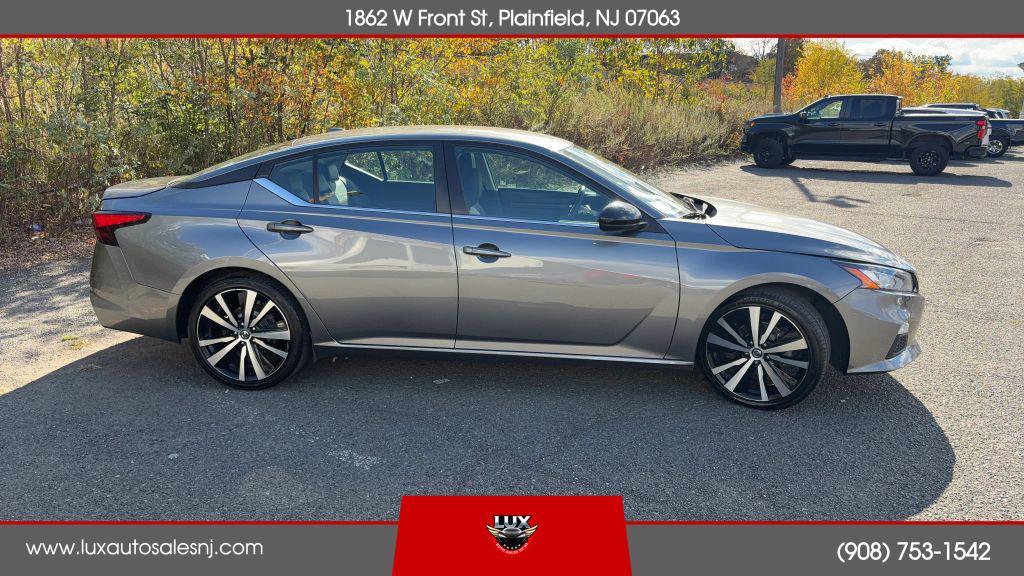 used 2022 Nissan Altima car, priced at $13,990