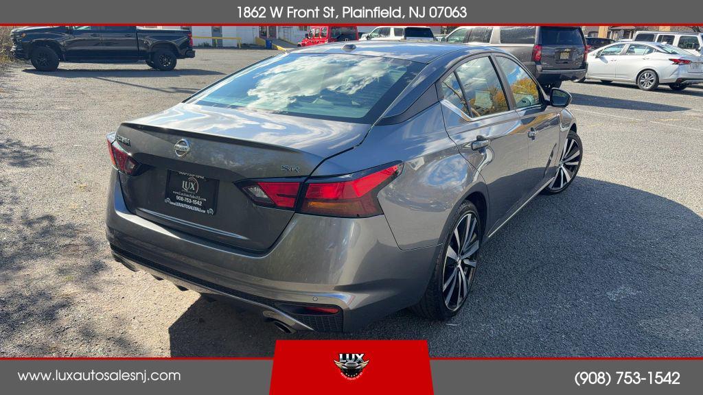 used 2022 Nissan Altima car, priced at $13,990