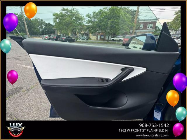 used 2021 Tesla Model Y car, priced at $26,995