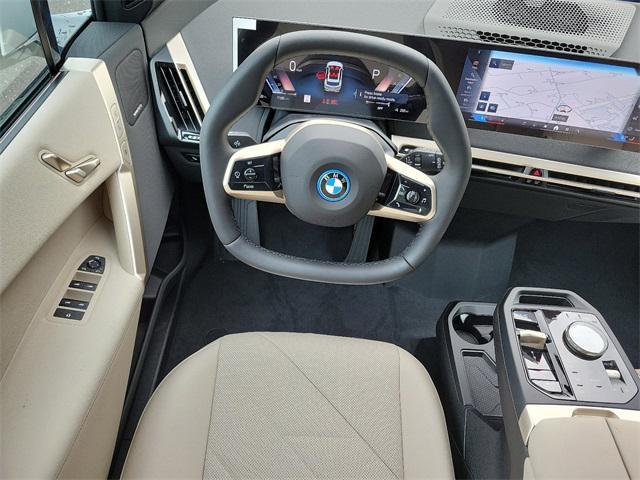 new 2025 BMW iX car, priced at $97,325