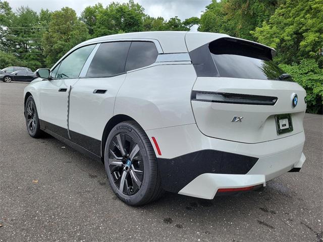 new 2025 BMW iX car, priced at $97,325