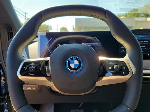 new 2025 BMW iX car, priced at $93,325