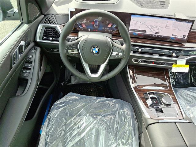 new 2026 BMW X5 car, priced at $78,325