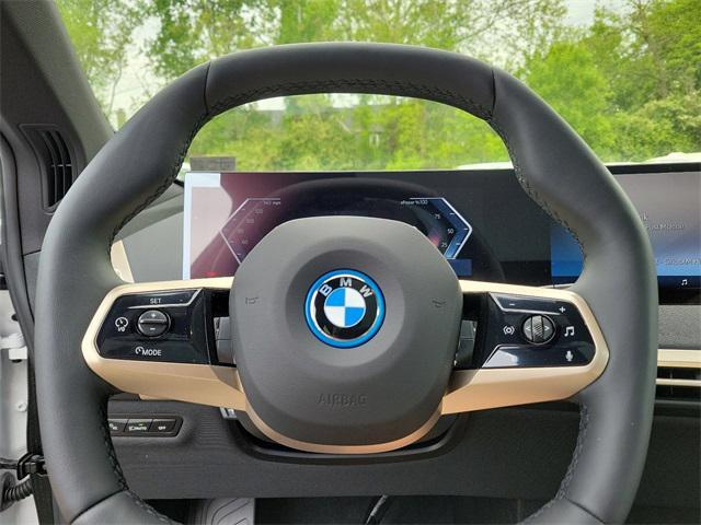 new 2025 BMW iX car, priced at $97,570