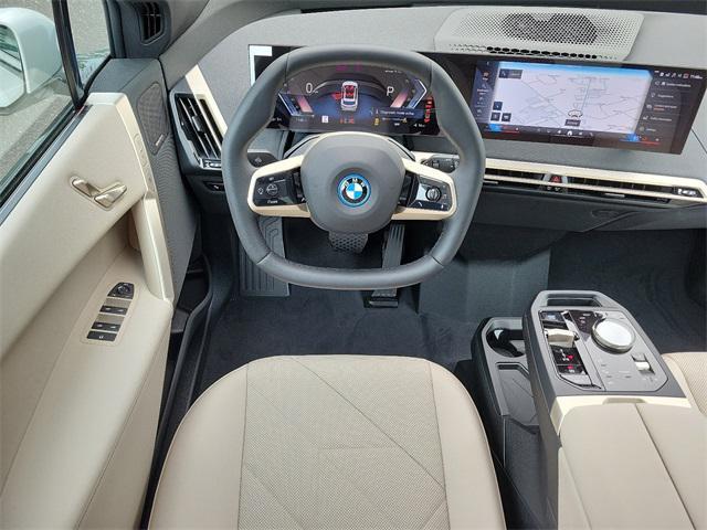 new 2025 BMW iX car, priced at $97,570