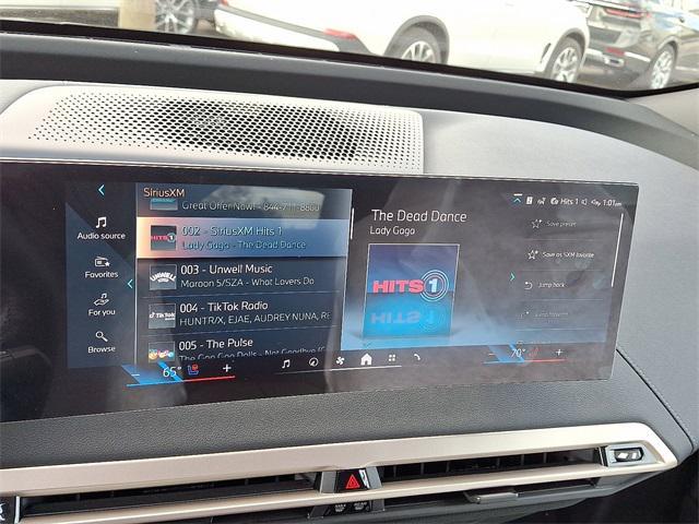 new 2026 BMW iX car, priced at $99,270