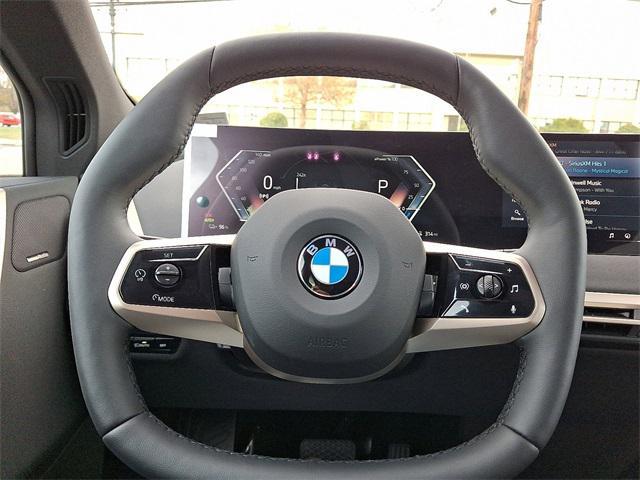 new 2026 BMW iX car, priced at $97,320