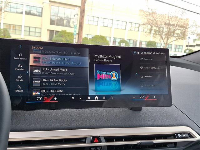 new 2026 BMW iX car, priced at $97,320