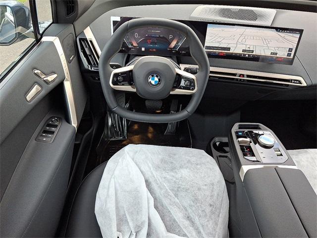 new 2026 BMW iX car, priced at $97,320