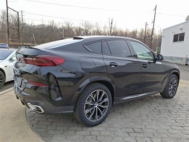 new 2025 BMW X6 car, priced at $83,625