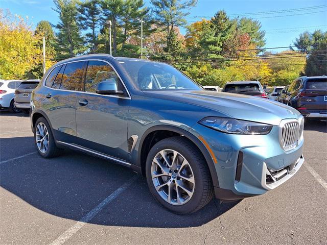 new 2025 BMW X5 PHEV car, priced at $79,010