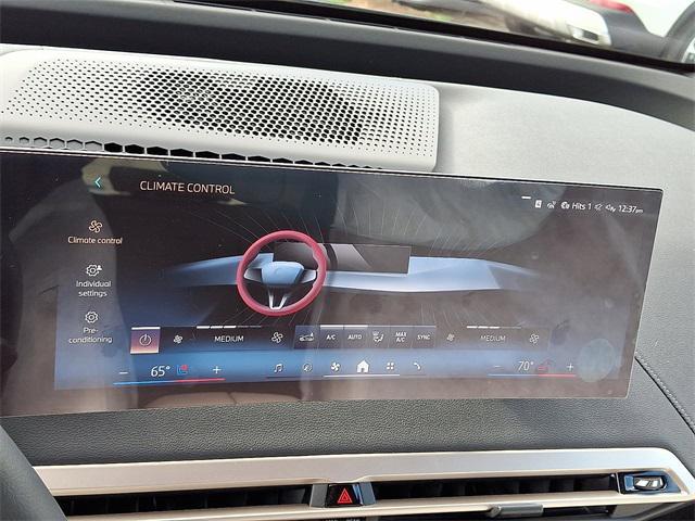 new 2026 BMW iX car, priced at $97,320