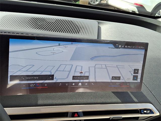 new 2026 BMW iX car, priced at $97,320