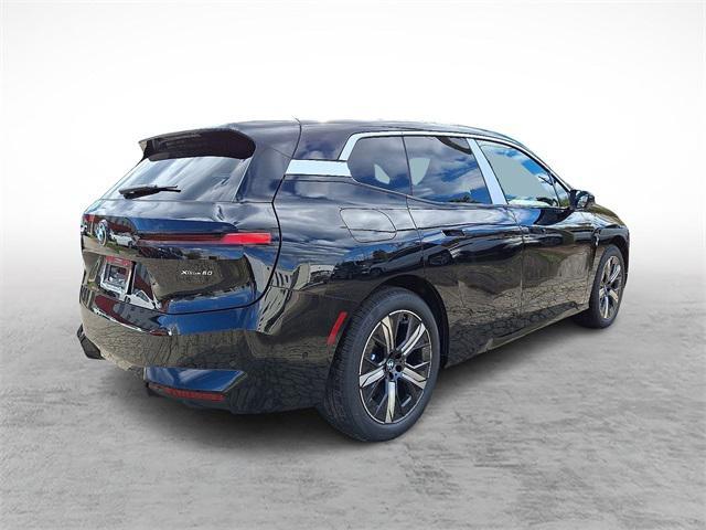 new 2026 BMW iX car, priced at $97,320