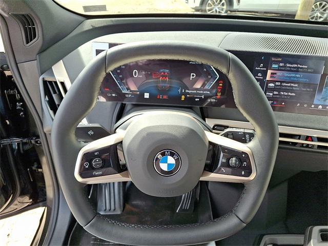 new 2026 BMW iX car, priced at $97,320