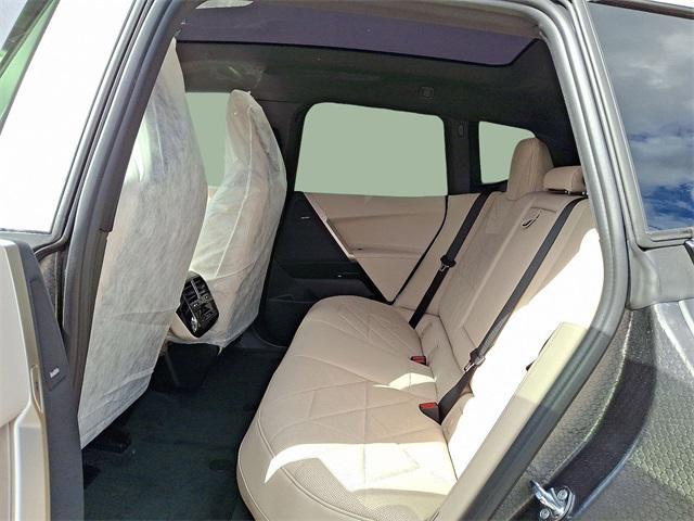 new 2026 BMW iX car, priced at $97,320