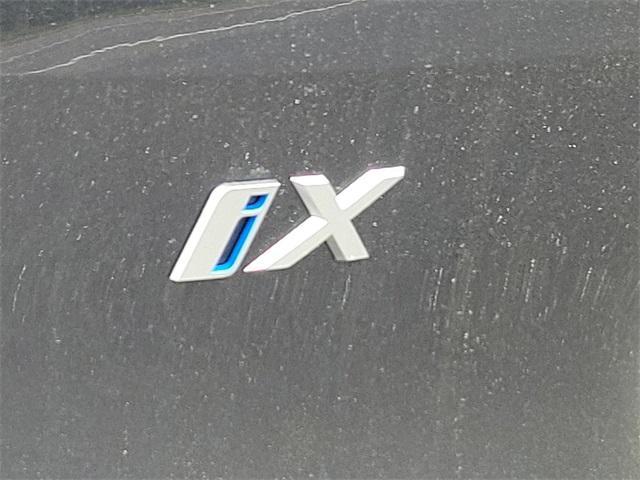 new 2024 BMW iX car, priced at $95,595